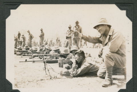 Men practicing shooting (ddr-densho-545-31)