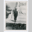 Soldier standing in front of statue (ddr-densho-368-163)