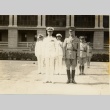 Harry E. Yarnell standing with other men in uniform (ddr-njpa-1-2619)