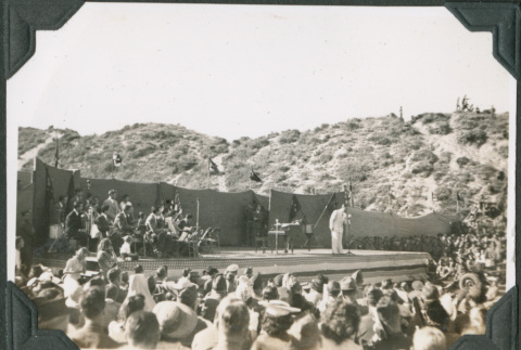 Men in audience in front of stage (ddr-ajah-2-120)