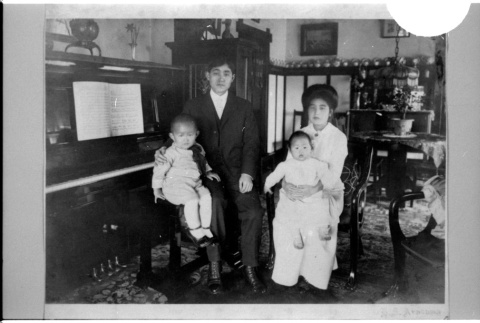 Family photo in formal wear (ddr-densho-1007-1269)