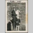 Man with toddler, holding baby (ddr-densho-483-699)