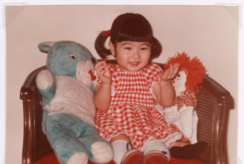Kellie Dawn Isoshima with bear and doll (ddr-densho-477-476)