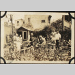 Group in garden with shed in back (ddr-densho-423-516)