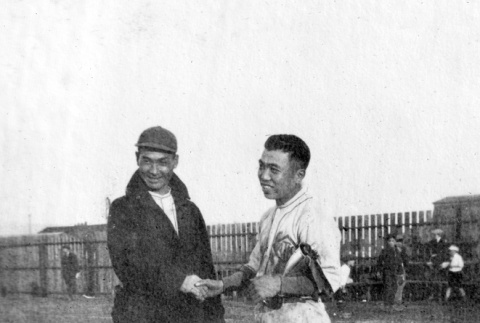 Two men in baseball uniforms shaking hands (ddr-ajah-5-52)