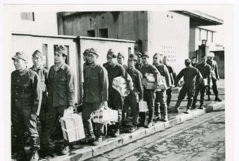 Japanese war criminals leaving Sugamo Prison in Tokyo (ddr-densho-1007-114)
