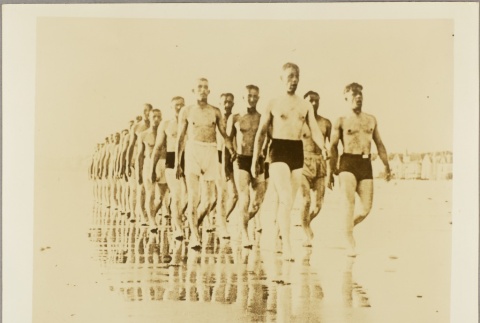 German soldiers in bathing suits walking on a beach (ddr-njpa-13-892)