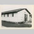 Man stands outside the grounds division (ddr-densho-37-1043)