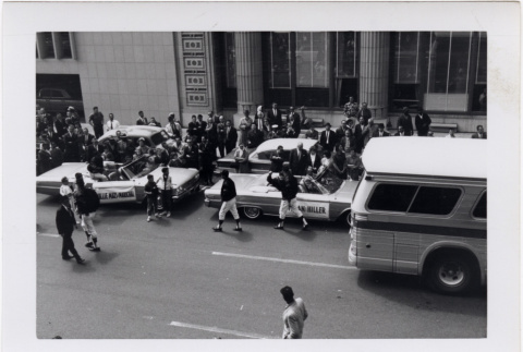 Black and white photo of cars in parade (ddr-densho-426-15)