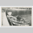 Two soldiers in rowboat on water (ddr-densho-368-102)