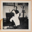 Photo of a woman with cloths (ddr-densho-483-475)