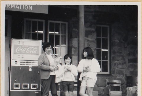 Woman and two girls outside building (ddr-densho-522-123)