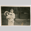 Girl with doll (ddr-densho-423-561)