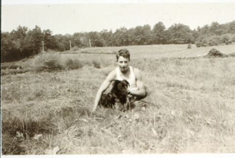 Robert H. Foote, age 15, with his dog (ddr-densho-1007-587)