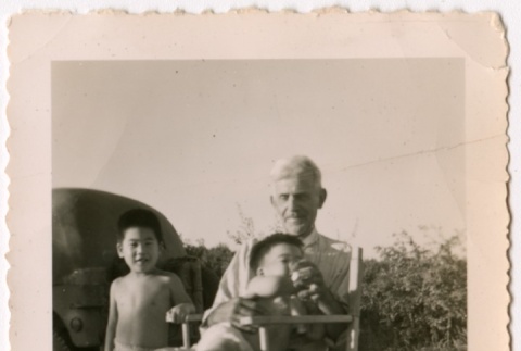 Japanese American man and children (ddr-densho-325-427)