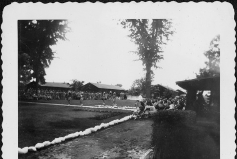 Group of spectators watching a parade (ddr-densho-434-388)
