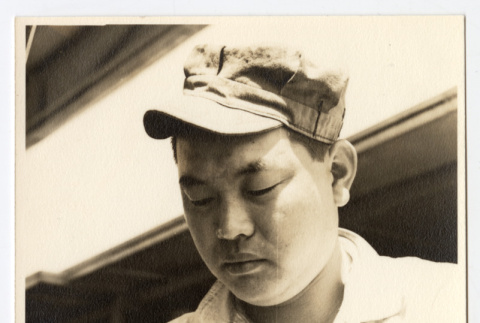 Man holding tools (ddr-densho-542-805)