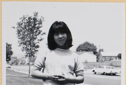 Girl standing in driveway (ddr-densho-522-111)