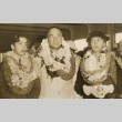 A man, woman, and boy wearing leis (ddr-njpa-1-511)