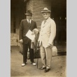W. Cameron Forbes standing with a man (ddr-njpa-1-384)