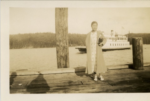 Woman on a ferry dock (ddr-densho-16-22)