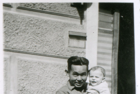Soldier and child (ddr-densho-1007-779)