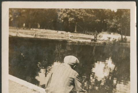 Man by pond (ddr-densho-316-215)