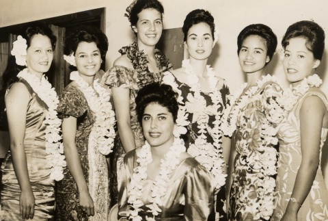 Group photograph of women posing with leis (ddr-njpa-2-140)