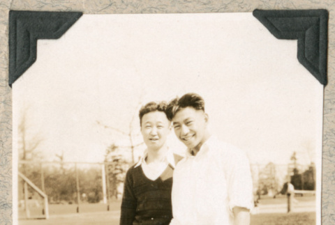 Two men in park with rackets (ddr-densho-383-69)