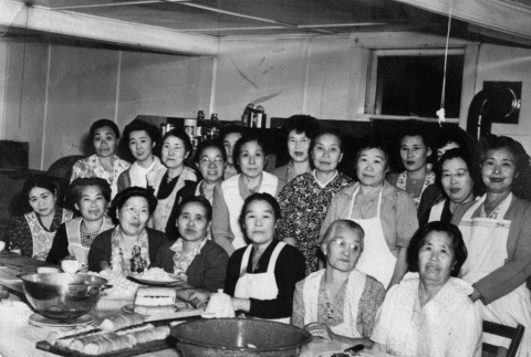 Group of women in aprons in Temple kitchen (ddr-ajah-3-237)