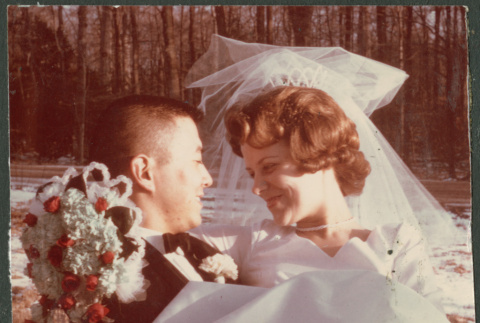 Groom carrying bride (ddr-densho-523-382)