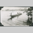 Man and two children in canoe (ddr-ajah-2-628)