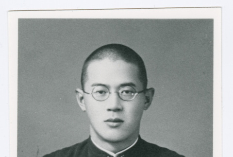 Portrait of person with crew cut and glasses (ddr-densho-1007-66)
