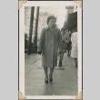 Woman walking down the street (ddr-densho-321-245)