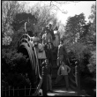 Children standing on Moon Bridge in Japanese Garden in Golden Gate Park (ddr-densho-426-965)