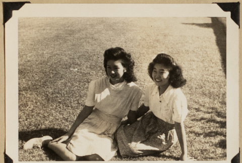 Jackie and Miyo on a lawn (ddr-densho-542-560)
