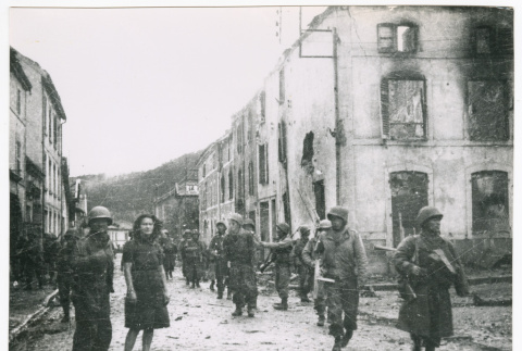 Soldiers and civilian in Bruyeres (ddr-densho-1007-38)