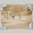 Four people walking in Mount Baker Park (ddr-densho-383-141)