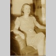 Woman seated in a chair (ddr-njpa-1-2542)