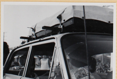 Group sitting in car (ddr-densho-522-101)