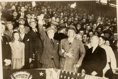 Franklin D. Roosevelt waving to a crowd (ddr-njpa-1-1494)