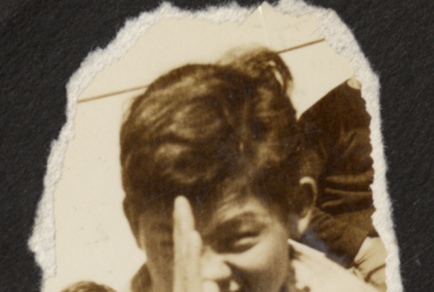 Man with hand in front of face (ddr-densho-287-327)
