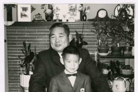 Takeo Isoshima and son Mark Isoshima dressed in suits (ddr-densho-477-356)