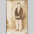 Portrait of man standing (ddr-densho-493-161)