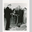 Captain Herbert G. Claudius returns sword to Kenjiro Tobita, former captain in the Imperial Japanese Navy (ddr-densho-1007-123)