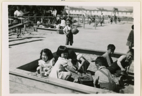 Children playing in a sandbox (ddr-densho-37-1066)