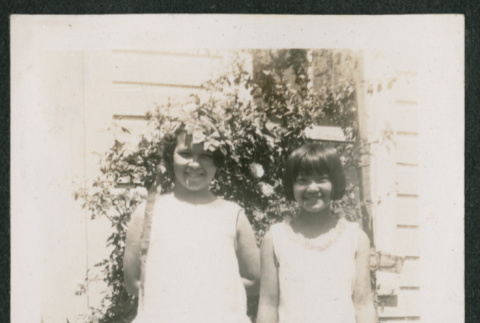 two girls in yard (ddr-densho-378-307)