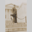 Soldier standing in front of monument (ddr-janm-17-9)