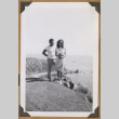 Man and woman on a cliff side (ddr-densho-542-77)