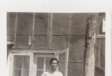 Tomio Otani outside a barrack (ddr-densho-471-5)